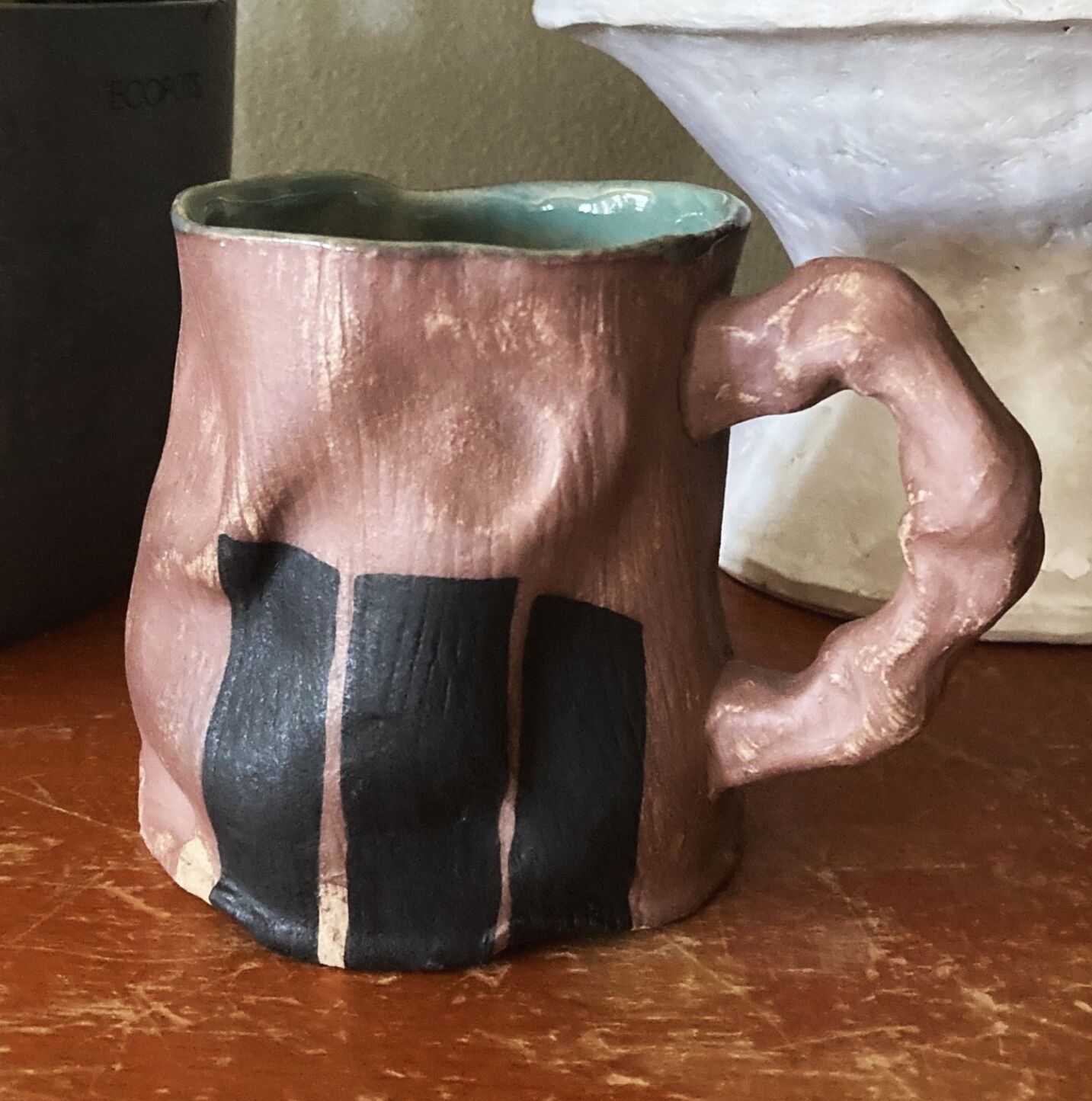 Kids making mugs